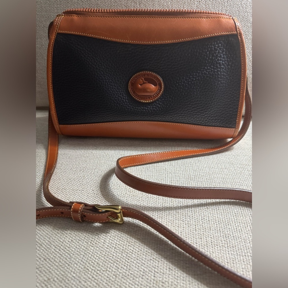 Dooney & Bourke- 
++ Like New++
Beautiful Dark Navy Crossbody (looks black)
